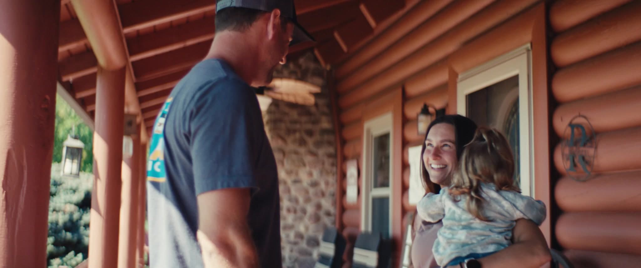 A MAXI Mobile technician handing keys back to a customer in their driveway